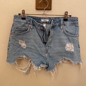 Distressed denim shorts